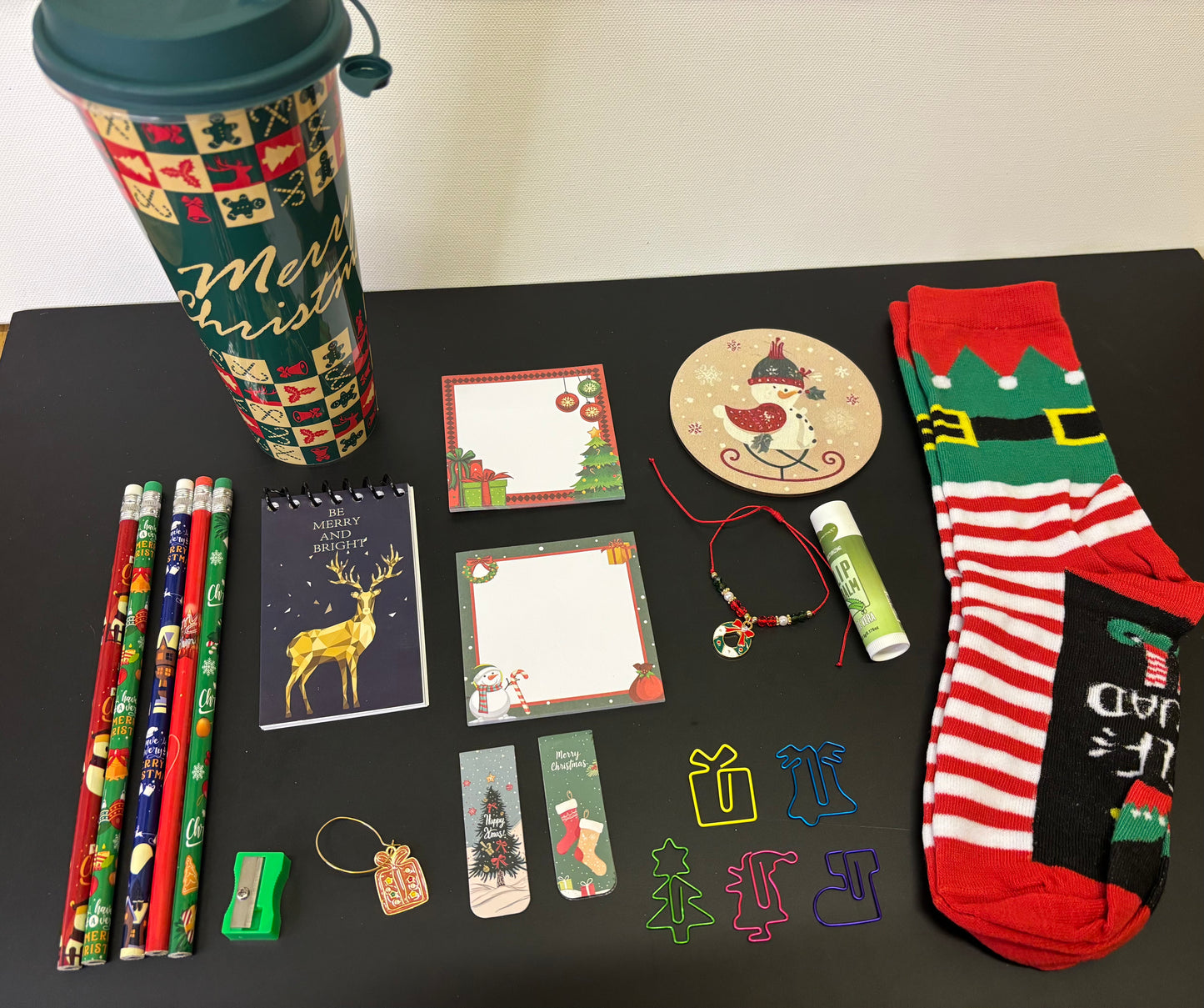 Christmas Gift Set of Stationery Socks Cup and Coaster Featuring Festive Designs and Practical Accessories