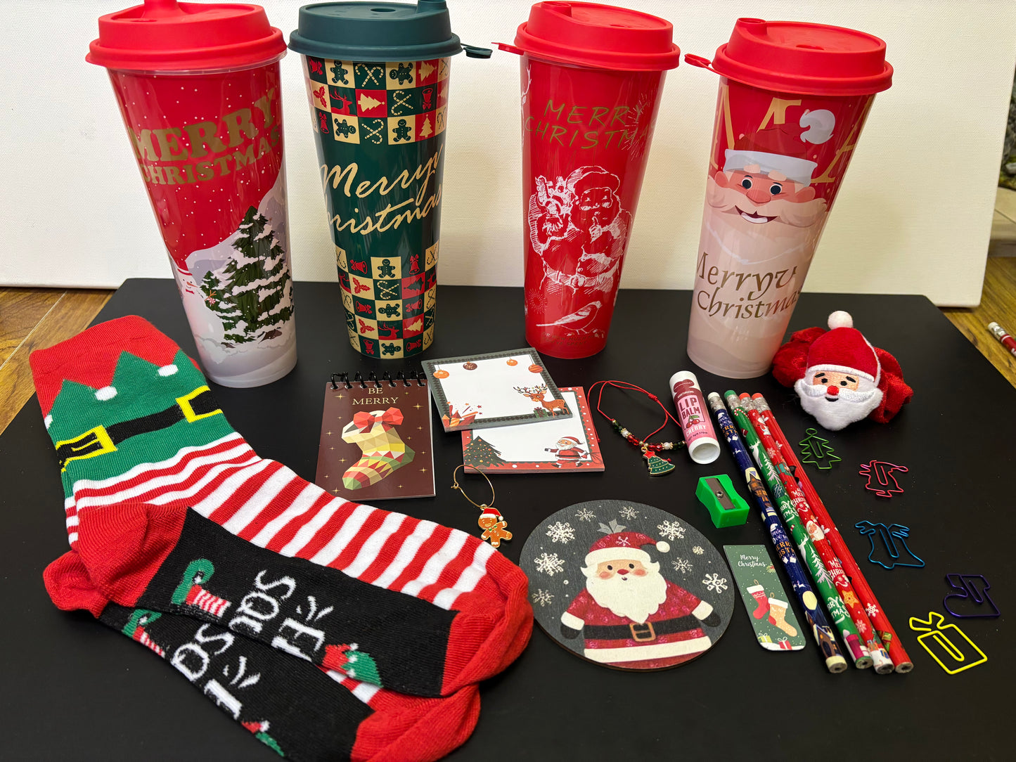 Christmas Gift Set of Stationery Socks Cup and Coaster Featuring Festive Designs and Practical Accessories